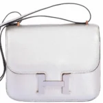 Best Replica Hermès Constance 18 Metallic Silver Chevre PHW - Exotic Creations Front