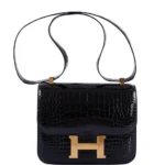 Hermès Dupe Constance 24 Verso Shiny Black Alligator & Rouge H GHW - Exotic Creations
