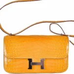 Hermès Dupe Constance Elan Saffron Shiny Niloticus Crocodile PHW - Exotic Creations
